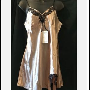 Gorgeous champagne colored Satin Chemise Size Large. Condition is